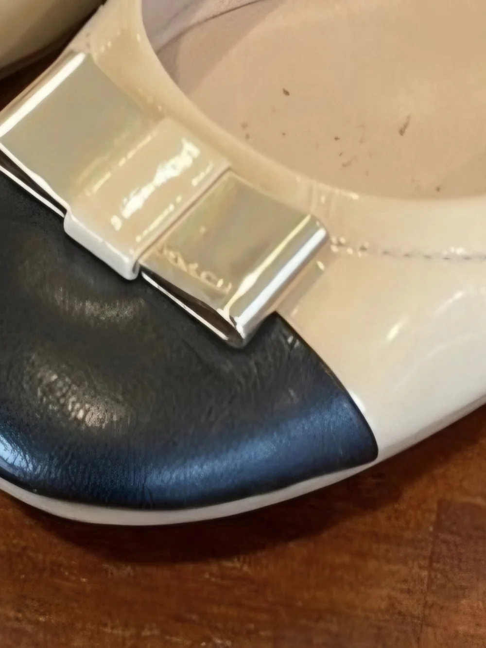 Coach Two-Tone Patent Bow Cap-Toe Ballet Flats in Beige and Black